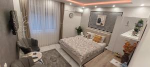 Voodi või voodid majutusasutuse GOLD APARTMANI toas
