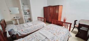Postel nebo postele na pokoji v ubytování Casa Ines