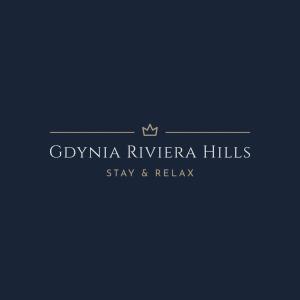 a logo for a hotel with a crown on it at Gdynia Riviera Hills in Gdynia