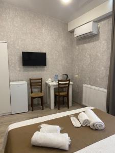 Μια τηλεόραση ή/και κέντρο ψυχαγωγίας στο Mimino T&G