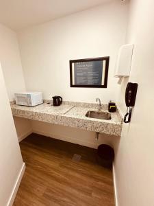 Kuchyň nebo kuchyňský kout v ubytování Charrua Hotel