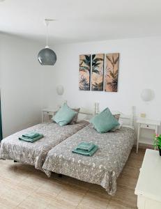Posteľ alebo postele v izbe v ubytovaní Casa Cactus