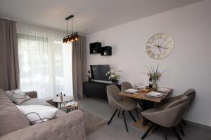 TV a/nebo společenská místnost v ubytování Studio Apartman Apollonia