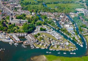an aerial view of a harbor with boats at Peaceful Riverside Family Retreat in Christchurch