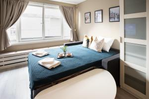 Katil atau katil-katil dalam bilik di Ultracentral duplex with private rooftop terrace