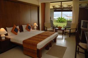 Letto o letti in una camera di Coral Sands Hotel