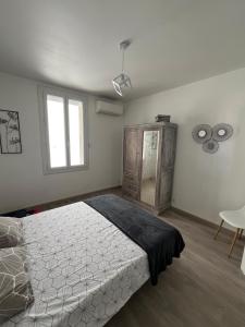 Postel nebo postele na pokoji v ubytování Le Carmagnol