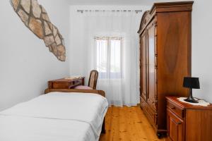 Postel nebo postele na pokoji v ubytování Holiday Home Regina