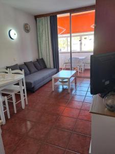 Khu vực ghế ngồi tại Studio-appartement EL CHAPARRAL con hermosa vista y piscina