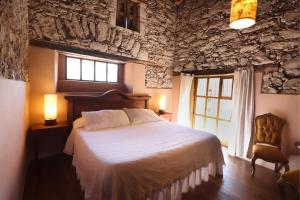 Postel nebo postele na pokoji v ubytování Hotel Boutique Mesón de la Abundancia