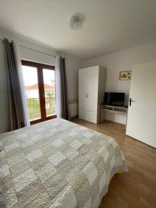 Kuchyň nebo kuchyňský kout v ubytování Apartments Kekel