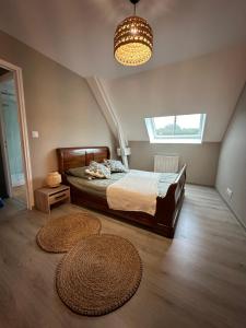 Postel nebo postele na pokoji v ubytování Gîte de Monthardrou