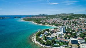 an aerial view of a city next to the ocean at Meri Rooms in Vodice