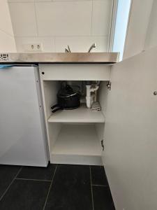 Kuchyň nebo kuchyňský kout v ubytování Chambre d'Hôte Confort Ettelbruck
