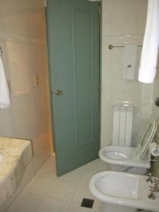 Phòng tắm tại Apart hotel condor suite