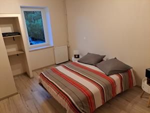 Postel nebo postele na pokoji v ubytování Gîte La Dolce Vita