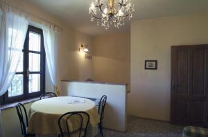Postel nebo postele na pokoji v ubytování Agriturismo Corte Virgiliana