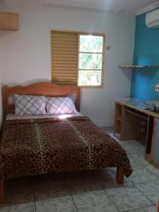 Un pat sau paturi într-o cameră la Apto-Cond Parque Ingleses- Alter Temporada