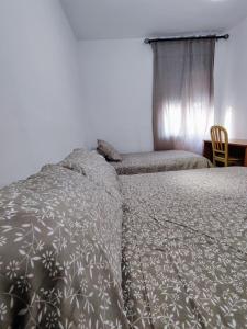 Кровать или кровати в номере Apartamento Doctor Fleming