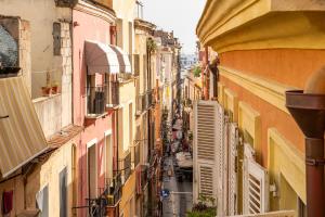an overhead view of an alley between buildings at Sabamiglia Apartments in Cagliari