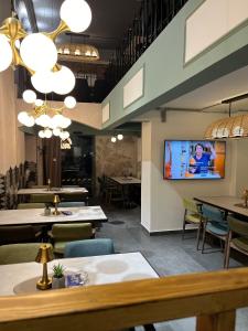 TV o dispositivi per l'intrattenimento presso Hotel Astra