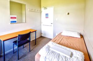 Postel nebo postele na pokoji v ubytování Te Anau Lakeview Holiday Park & Motels