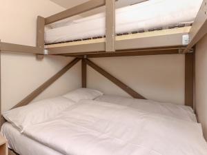 Postel nebo postele na pokoji v ubytování Golden Hirsch