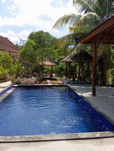Πισίνα στο ή κοντά στο Citronella Homestay Nusa Penida