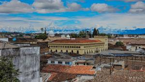 an overhead view of a city with buildings and roofs at CASA LOMA HOTEL BOUTIQUE & TERRAZA GASTRO in Popayan