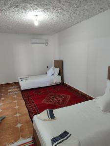 Rúm í herbergi á Villa Naima