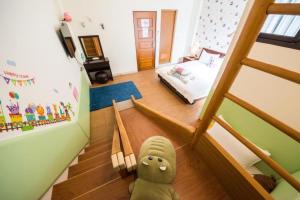 En eller flere senger på et rom på Sioufu B&B
