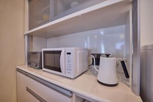 Köök või kööginurk majutusasutuses Garage villa KuuMa