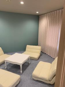 Relak Guest House 登別 Station的休息区