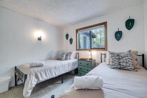 a bedroom with two beds and a window at Close to Locust Lake:Beach:Fire Pit:Kalahari in Locust Lakes Village
