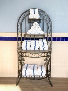 a towel rack with towels on it in a bathroom at Country Trails Inn &Suites in Lanesboro