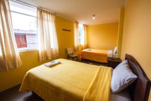 Katil atau katil-katil dalam bilik di La Posada de Lucero