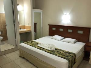 Postel nebo postele na pokoji v ubytování Hotel Xcalak