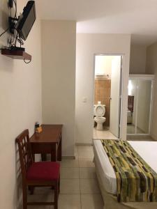 Postel nebo postele na pokoji v ubytování Hotel Xcalak