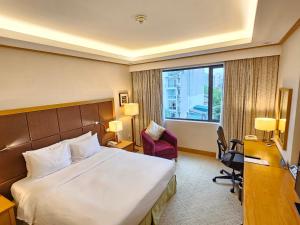 Postel nebo postele na pokoji v ubytování Hilton Garden Inn Hanoi + 37 fotografií