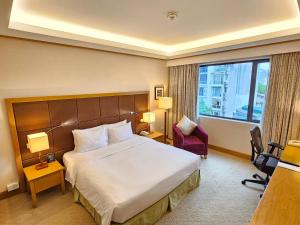 Postel nebo postele na pokoji v ubytování Hilton Garden Inn Hanoi