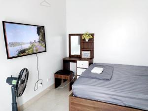 Postel nebo postele na pokoji v ubytování Nha Xanh Homestay