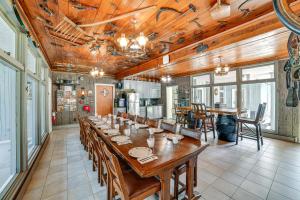 a large dining room with a long table and chairs at Massive Roscoe Retreat Great for Large Groups! in Roscoe