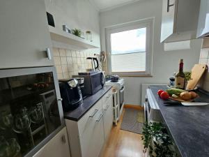 Kuchyň nebo kuchyňský kout v ubytování Apartment Sophia
