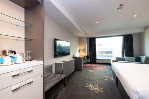 Posteľ alebo postele v izbe v ubytovaní SkyCity Hotel Auckland