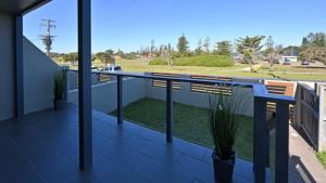 a view from the balcony of a house at Sea Breeze in Old Bar