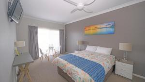 Ένα ή περισσότερα κρεβάτια σε δωμάτιο στο Apartment 31 - The Meridian