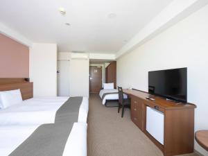 Sjónvarps- og/eða afþreyingartæki á Vessel Hotel Kanda Kitakyushu Airport