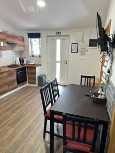 Kuchyň nebo kuchyňský kout v ubytování Apartma Mia