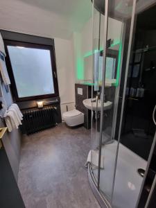 Koupelna v ubytování Hotel Kurhaus Uhlenberg