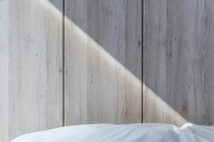 Llit o llits en una habitació de 札幌白色戀人巧克力觀光工場旁四房二衛浴包棟別墅！宮之澤地鐵站步行三分鐘 靠近超市 高速Wi-Fi